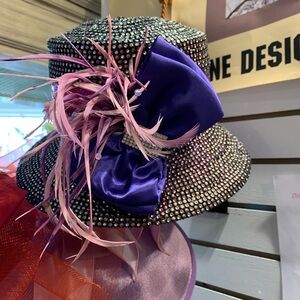 Elegant Purple and Pink Feathered Hat